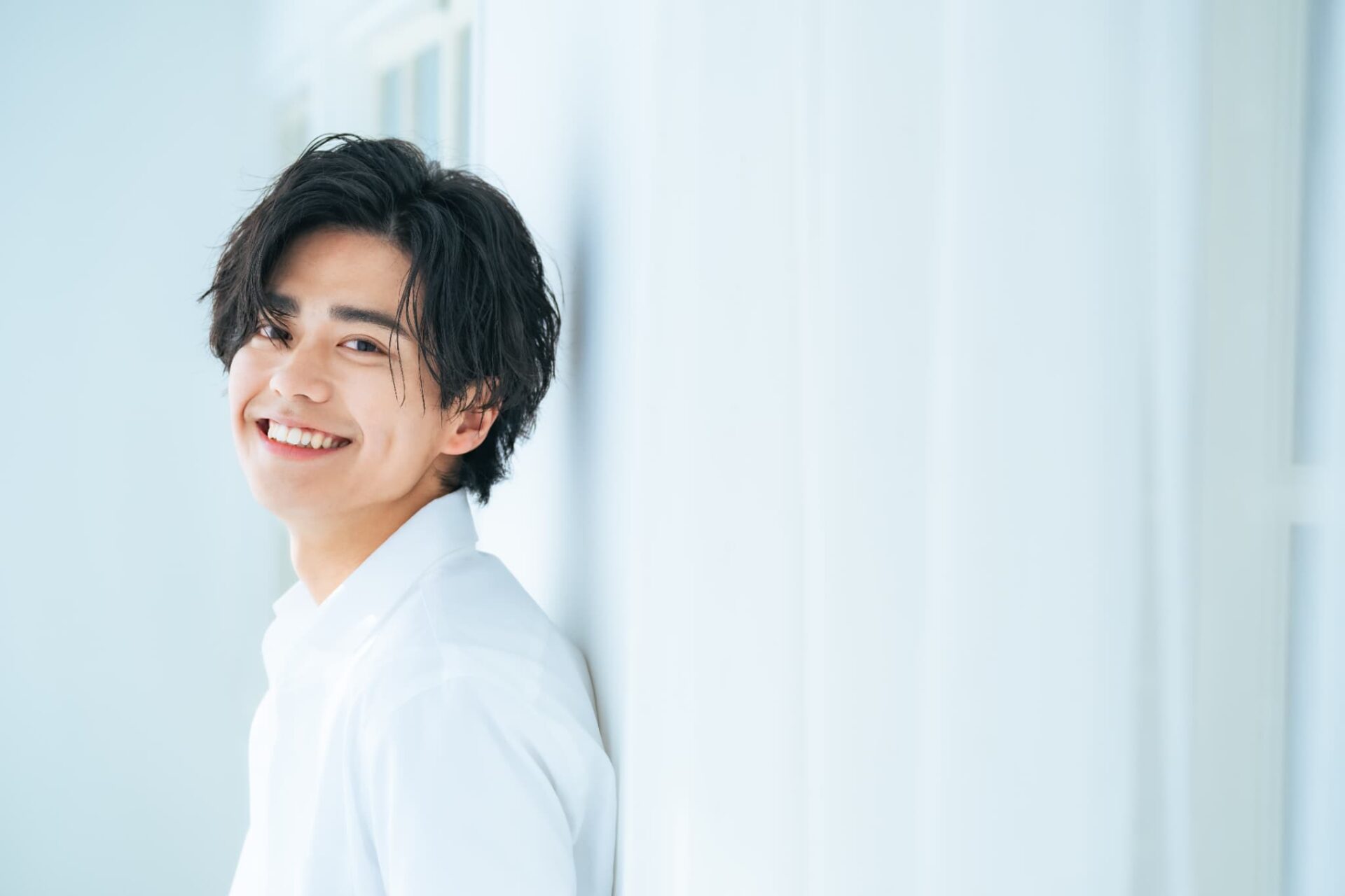 根管治療を終えて笑顔の男性